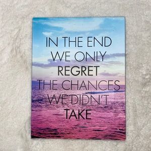 Wall decor with a quote over a sunset